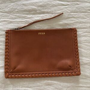 FEED leather clutch bag